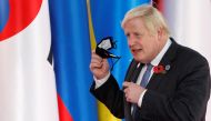 United Kingdom's Prime Minister Boris Johnson arrives for the G20 leaders summit in Rome, Italy October 30, 2021. REUTERS/Guglielmo Mangiapane
