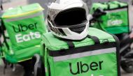 Delivery bags with logos of Uber Eats are seen on a street amid the outbreak of the coronavirus disease (COVID-19) in central Kiev, Ukraine May 27, 2020. Reuters/Valentyn Ogirenko/File Photo