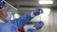 A medical worker prepares an injection with a dose of AstraZeneca COVID-19 vaccine, at a vaccination centre in Zagreb Fair hall, amid the outbreak of coronavirus disease (COVID-19), Croatia, April 7, 2021. REUTERS/Antonio Bronic