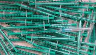 Empty syringes are pictured after a coronavirus disease (COVID-19) vaccination at a doctor's office in Berlin, Germany, November 2, 2021. REUTERS/Hannibal Hanschke

