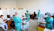 Medical staff are seen as the coronavirus disease (COVID-19) vaccination continues at the University Hospital, in Nitra, Slovakia January 11, 2021. REUTERS/Radovan Stoklasa

