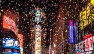 File Photo: Confetti flies around the ball and countdown clock in Times Square during the virtual New Year's Eve event in Manhattan, New York, January 1, 2021. REUTERS/Jeenah Moon

