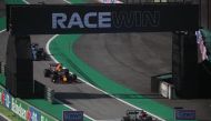 Mercedes' Lewis Hamilton crosses the finish line to win the race REUTERS/Ricardo Moraes