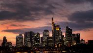 The skyline with its office buildings and the banking district are photographed during sunset as the spread of the coronavirus disease (COVID-19) continues and the German government plans new pandemic control measures in Frankfurt, Germany, November 18, 2021. REUTERS/Kai Pfaffenbach
