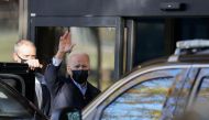 U.S. President Joe Biden waves to reporters as he arrives for his annual physical at Walter Reed National Military Medical Center in Bethesda, Maryland, U.S., U.S. November 19, 2021. REUTERS/Jonathan Ernst