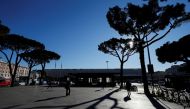 People walk at Termini train station, as the government discusses more stringent rules for the coronavirus disease (COVID-19) health pass known as a Green Pass, in Rome, Italy November 24, 2021. REUTERS/Yara Nardi