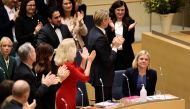 Current Finance Minister and Social Democrat leader Magdalena Andersson is congratulated after being appointed as the country's new Prime Minister following voting at the Swedish Parliament Riksdagen in Stockholm, Sweden November 24, 2021. Erik Simander /TT News Agency/via Reuters