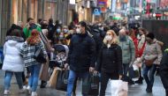 FILE PHOTO: Shoppers fill Cologne's main shopping street Hohe Strasse (High Street) in Cologne, Germany, Dec 12, 2020. REUTERS/Wolfgang Rattay/File Photo
