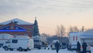 Vehicles of Russian emergency services are seen at the mine territory following an accident at the Listvyazhnaya coal mine in the Kemerovo region, Russia, November 26, 2021. REUTERS/Alexander Patrin