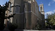 A woman wearing a protective face mask makes her way in Plaka district after the first case of the Omicron variant of coronavirus has been identified, in Athens, Greece, December 2, 2021. REUTERS/Louiza Vradi