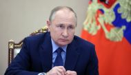 Russian President Vladimir Putin chairs a meeting on the country's coal-mining sector, following a deadly accident at the Listvyazhnaya mine in the Kemerovo region, in Moscow, Russia December 2, 2021. Sputnik/Mikhail Metzel/Poo 