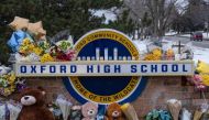 A memorial is seen at Oxford High school, a day after a shooting that left four dead and eight injured, in Oxford, Michigan. December 1, 2021. REUTERS/Seth Herald

