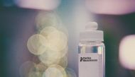 PBI-0451 protease inhibitor pills are seen in a container in this undated handout photo obtained by Reuters on December 16, 2021. Pardes Biosciences/Handout via Reuters