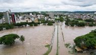 An aerial view shows a neighbourhood during flooding caused by the overflowing Cachoeira river in Itabuna, Bahia state, Brazil, December 26, 2021. Picture taken with a drone. REUTERS/Leonardo Benassatto
