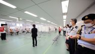 A member of Japan Self-Defense Forces is seen at a mass vaccination coronavirus disease (COVID-19) site in Tokyo, Japan June 9, 2021. David Mareuil/Pool via REUTERS/File Photo
