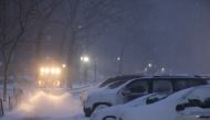 A plow clears a walkway in the snow during a Nor'easter storm in Manhattan, New York City, U.S., January 29, 2022. Reuters/Andrew Kelly