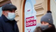 FILE PHOTO: People are seen outside a vaccination centre in the State Department Store, GUM, amid the outbreak of the coronavirus disease (COVID-19), in central Moscow, Russia January 18, 2021 REUTERS/Shamil Zhumatov


