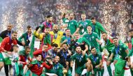 Algeria players and officials celebrate after winning the FIFA Arab Cup Qatar 2021 in this December 18, 2021 file photo.