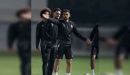 Al Sadd captain Hassan Al Haydos (foreground) with team-mates during a training session.