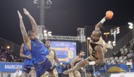Qatar’s Mohamed Hassan attempts to score a goal against Brazil during a semi-final of men’s beach handball at the first ANOC World Beach Games Qatar 2019, in this file photo. 