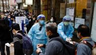 People queue up at a community testing centre for the coronavirus disease (COVID-19), in Hong Kong, China February 25, 2022. REUTERS/Tyrone Siu
