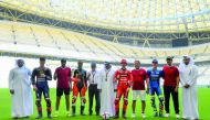 Qatar Motor and Motocycle Federation President Abdulrahman Al Mannai with MotoGP riders, football ball legend Cafu, former Qatari players and officials during a ceremony at the Lusail Stadium, yesterday.