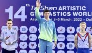 Illia Kovtun celebrates on the podium.
