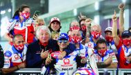 Pramac Racing’s Jorge Martin celebrates with his crew after qualifying in pole position ahead of the MotoGP Grand Prix of Qatar, yesterday.