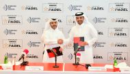 Ooredoo Chief Executive Officer Sheikh Mohammed bin Abdulla Al Thani and Qatar Tennis, Squash and Badminton Federation Secretary General and Tournament Director Tariq Zainal shake hands during the sponsorship-signing ceremony, yesterday. Picture: Abdul Basit