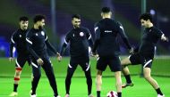 Qatar players during a training session at Aspire Zone yesterday. 