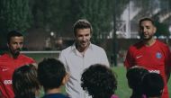 English football legend David Beckham with Paris Saint-Germain Academy players in Doha.