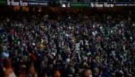 People attend the State Memorial Service for cricket legend Shane Warne at the Melbourne Cricket Ground (MCG) in Melbourne, Australia, March 30, 2022. AAP Image/Joel Carrett via REUTERS