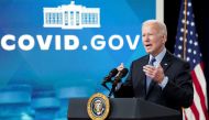 FILE PHOTO: U.S. President Joe Biden delivers remarks on the coronavirus disease (COVID-19) before receiving a second COVID-19 booster vaccination in the Eisenhower Executive Office Building’s South Court Auditorium at the White House in Washington, U.S., March 30, 2022. REUTERS/Kevin Lamarque/File Photo
