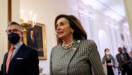 FILE PHOTO: U.S. House Speaker Nancy Pelosi (D-CA) arrives prior to President Joe Biden hosting an event on the Affordable Care Act, in the East Room at the White House in Washington, U.S., April 5, 2022. REUTERS/Leah Millis/File Photo
