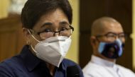 Forensic pathologist Raquel Fortun discusses findings on drug war deaths beside Catholic priest Flavie Villanueva, who counsels drug war victims, during a news conference in Manila, Philippines, April 12, 2022. REUTERS/Eloisa Lopez
