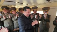 North Korean leader Kim Jong Un reacts during the test-firing of a new-type tactical guided weapon according to state media, North Korea, in this undated photo released on April 16, 2022 by North Korea's Korean Central News Agency (KCNA).