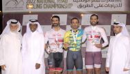 The podium winners of the men’s event pose with the officials. 