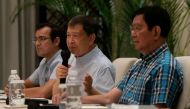 Former Defense Secretary Norberto Gonzales speaks during a joint news conference with Manila City Mayor Francisco 