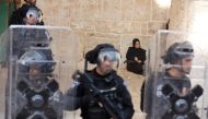 Israeli security forces inside the compound that houses Al-Aqsa Mosque in Jerusalem's Old City on April 22, 2022. (REUTERS/Ammar Awad)