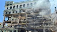 Debris is scattered after an explosion destroyed the Hotel Saratoga, in Havana, Cuba May 6, 2022. REUTERS/Alexandre Meneghini