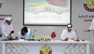 President of the Administrative Control and Transparency Authority H E Hamad bin Nasser Al Misnad and  President of the Office of the Ombudsman of Rwanda H E Nirere Madeleine signing the MoU in Doha, yesterday.
