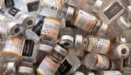 Empty vials of Pfizer-BioNTech COVID-19 vaccine for children over 5 are pictured at Skippack Pharmacy in Schwenksville, Pennsylvania, U.S., May 19, 2022. REUTERS/Hannah Beier/File Phot