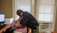 Constable David Valdez embraces Uvalde Justice of the Peace Eulalio Diaz as Diaz breaks down recounting having to identify the bodies of 19 children after they were shot by a gunman in Uvalde, Texas, U.S. May 25, 2022. Omar Ornelas/USA Today Network via REUTERS

