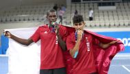 Qatar’s Mubarak Shannan and Rashed Nawaf celebrate after winning the silver medal at the third GCC Games.