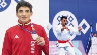 Ali Owaida (left) celebrates after winning the silver medal and Agham Hashem in action during the individual kata event.