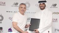 Al Sadd CEO Turki Al Ali with coach Juan Manuel Lillo during the presentation ceremony.