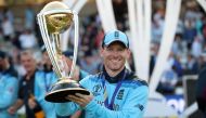England's Eoin Morgan celebrates winning the 2019 world cup with the trophy (Reuters/Peter Cziborra/File Photo)
