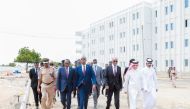 Prime Minister of Somalia H E Hamza Abdi Barre and other officials visiting the site of the Government Presidency Building project being funded by Qatar Fund for Development. 