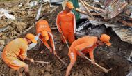 Members of National Disaster Response Force search for survivors after a landslide in Noney in the northeastern state of Manipur, India, on June 30, 2022. (Reuters)

