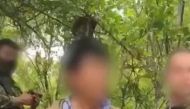 A picture of Rafael Caro Quintero, after he got detained, in Sinaloa state, Mexico, in this screengrab obtained from a video on July 15, 2022. Subject's face blurred at source. Mexican Navy/Handout via REUTERS ATTENTION EDITORS 
